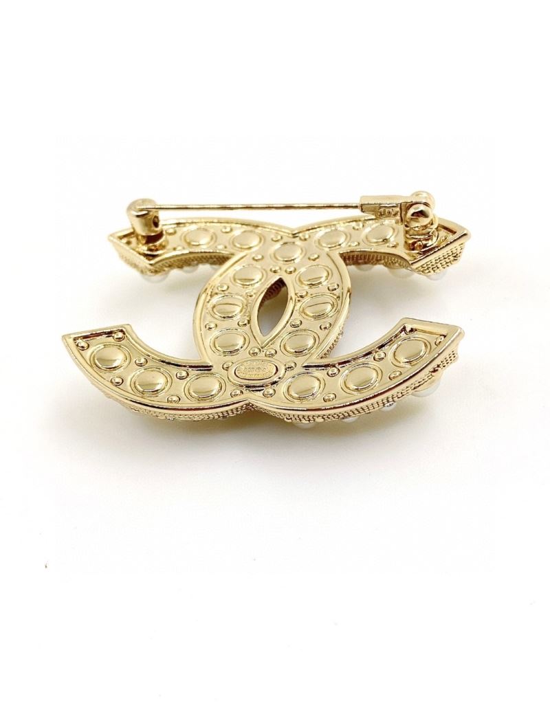 Ch**el brooches